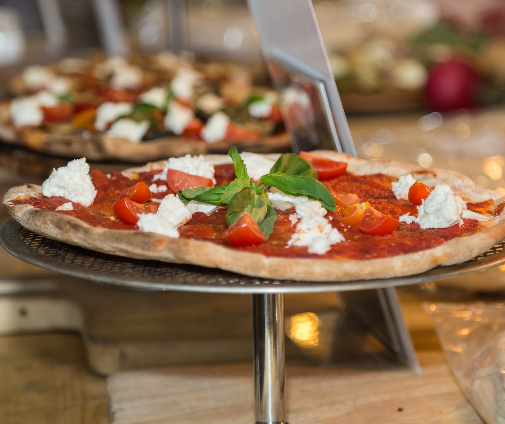 Close-up of artisanal pizza on stand